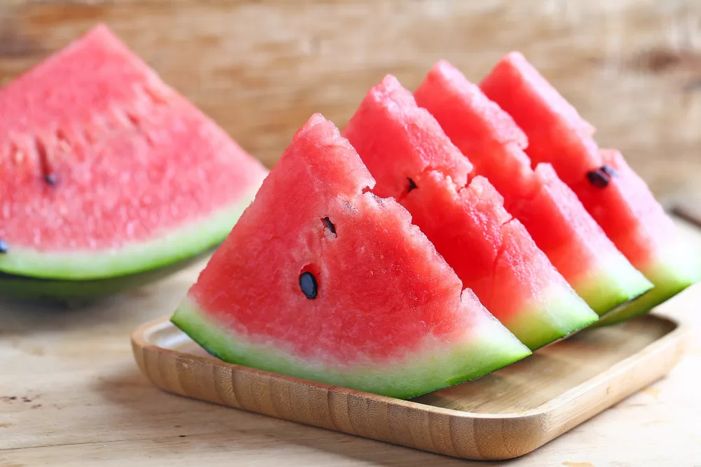 fresh sliced watermelon wooden background jpg